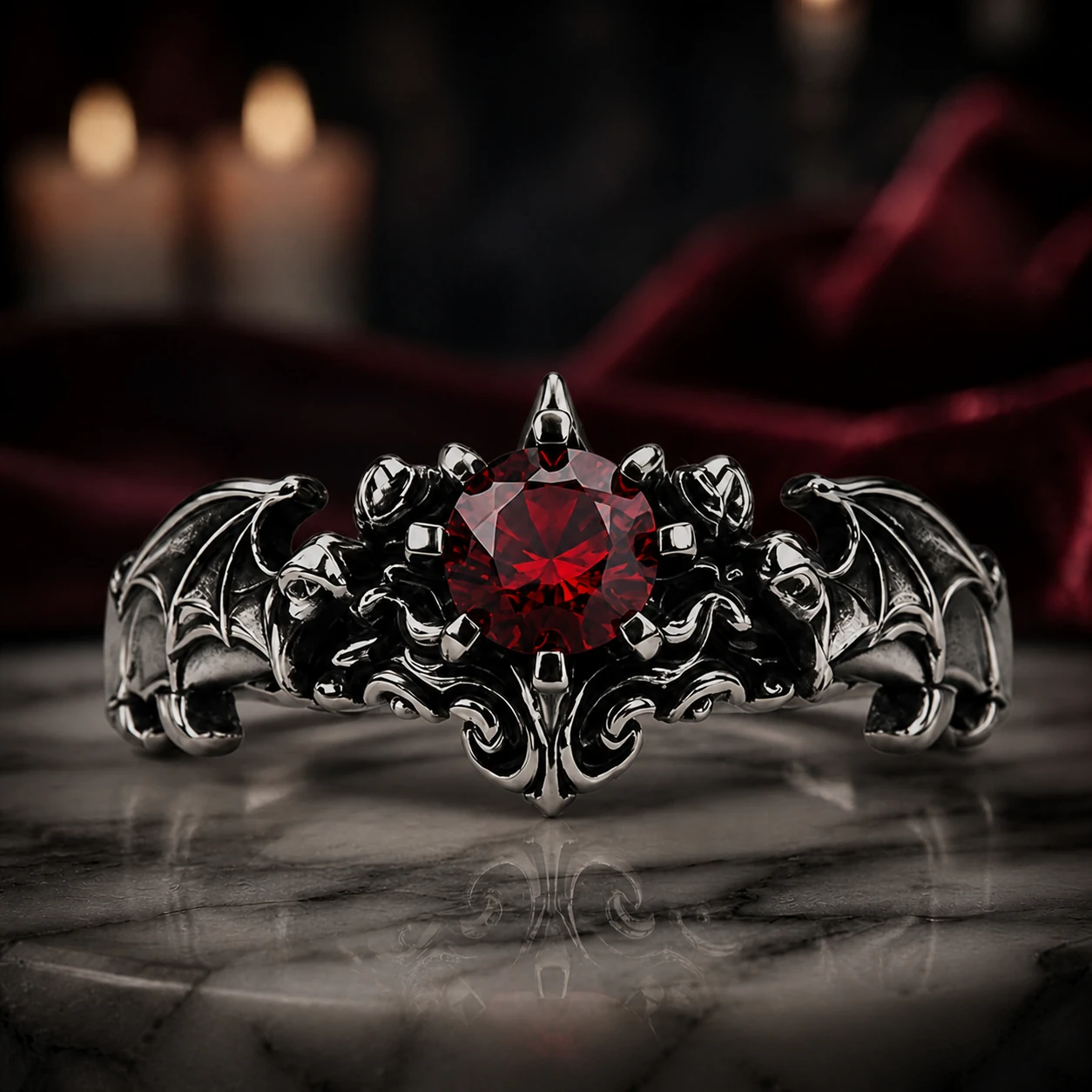 Garnet Bat Wing Ring — front view